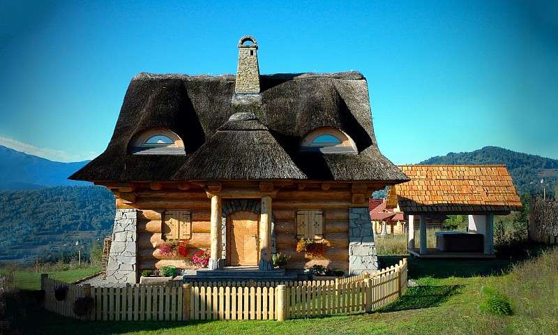 Cottage con tetti di paglia puzzle