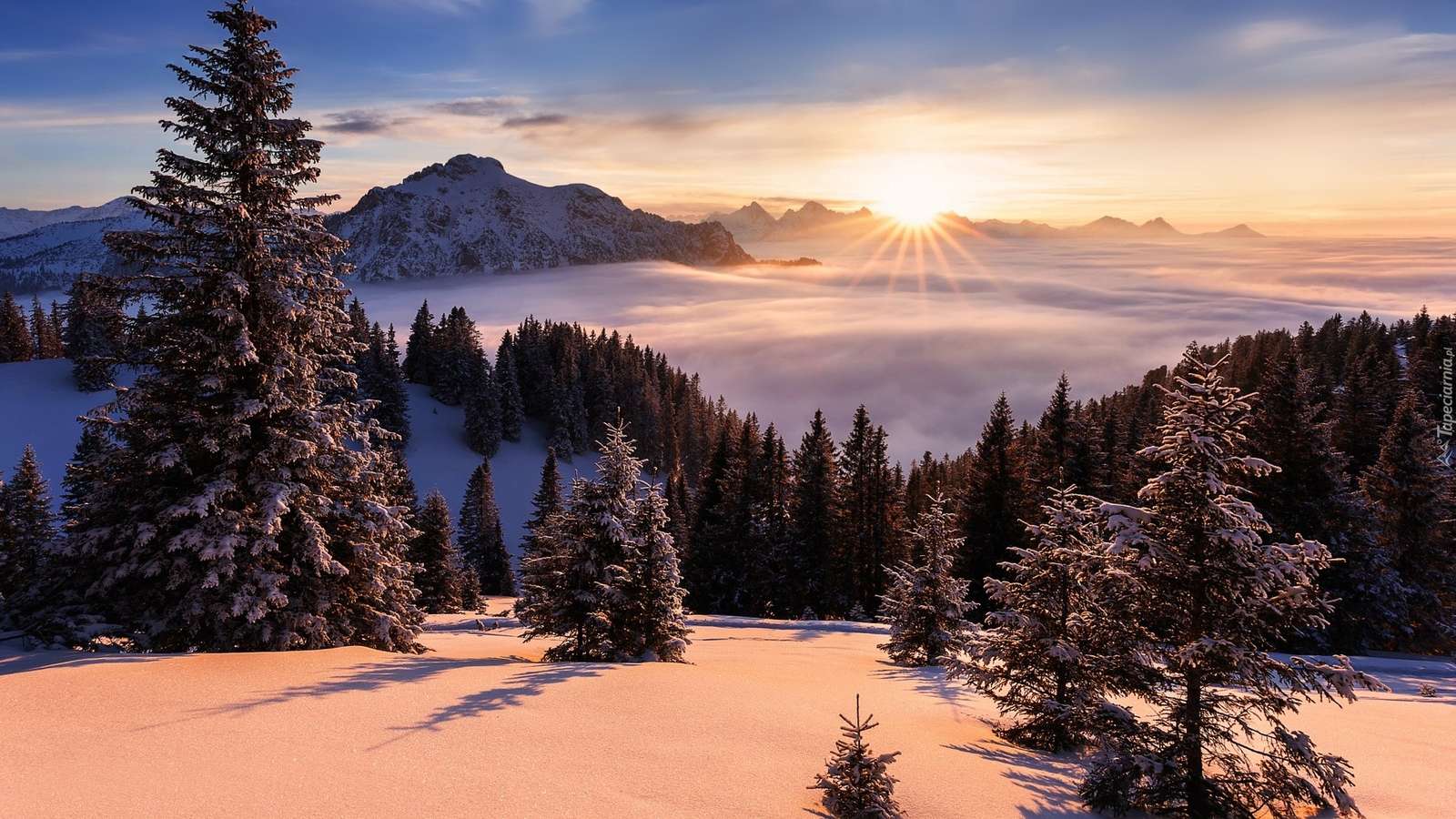 Zimowy wschód słońca w górach puzzle online