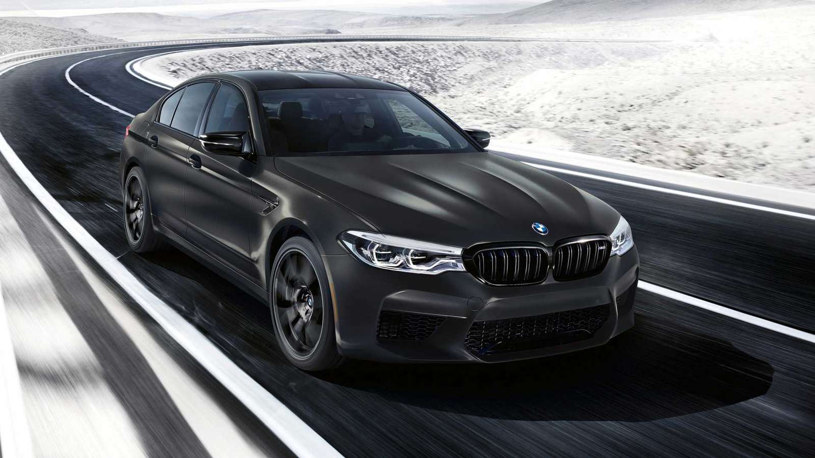 Czarny samochód BMW M5 puzzle online