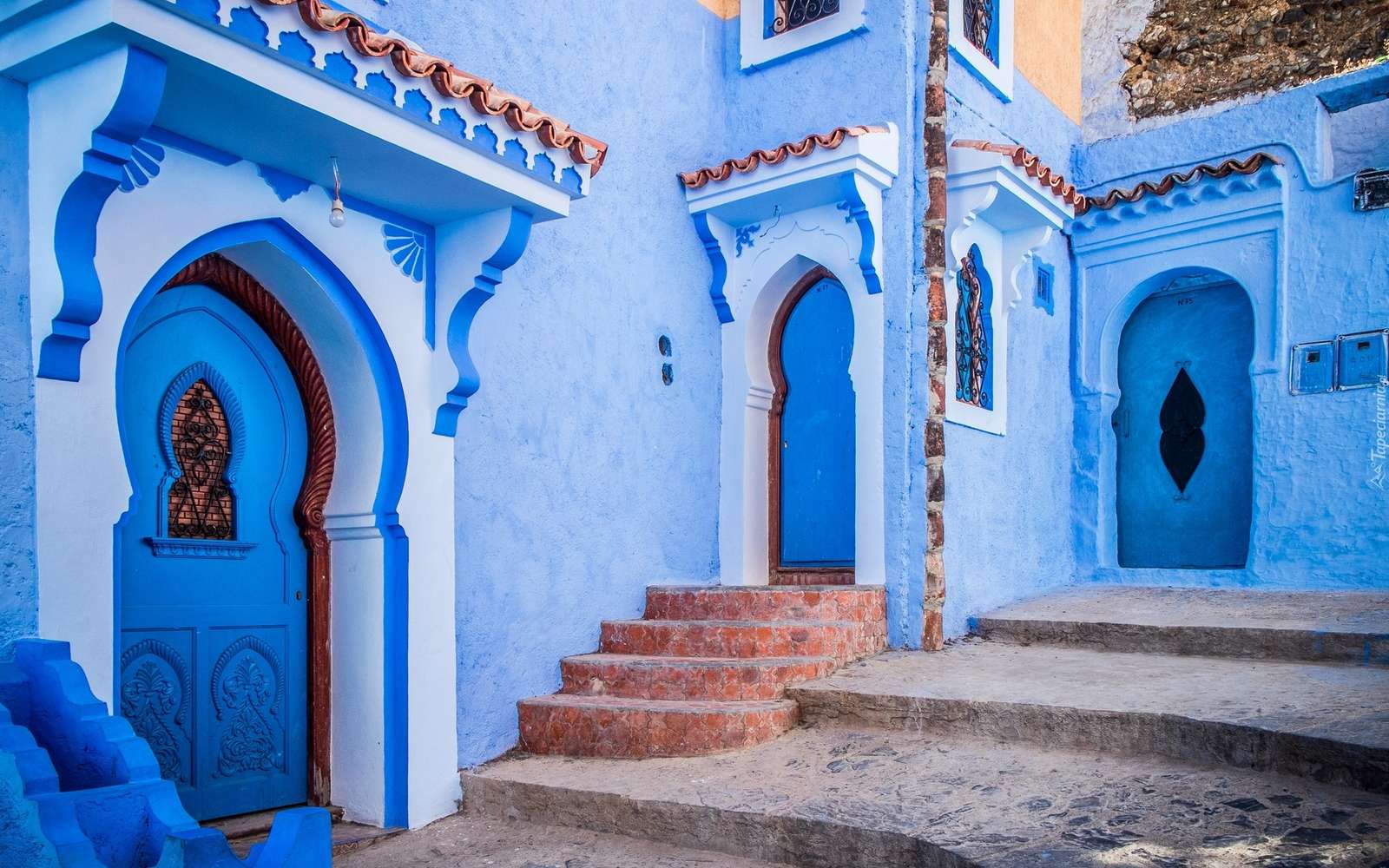 Uliczka i domy w marokańskim miasteczku Szafszawan puzzle online