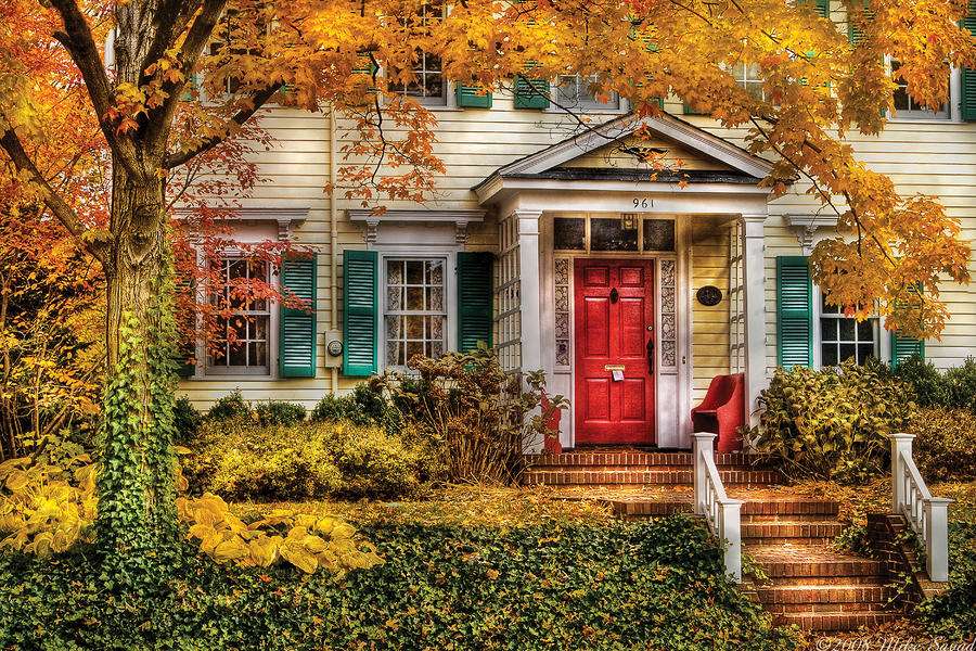 Dom otulony barwami jesieni puzzle online