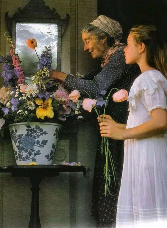Wnuczka z babcią i kwiaty puzzle online