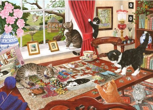 Kotki układające puzzle. puzzle online
