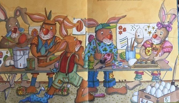 Rodzina królików malujących jajka puzzle online