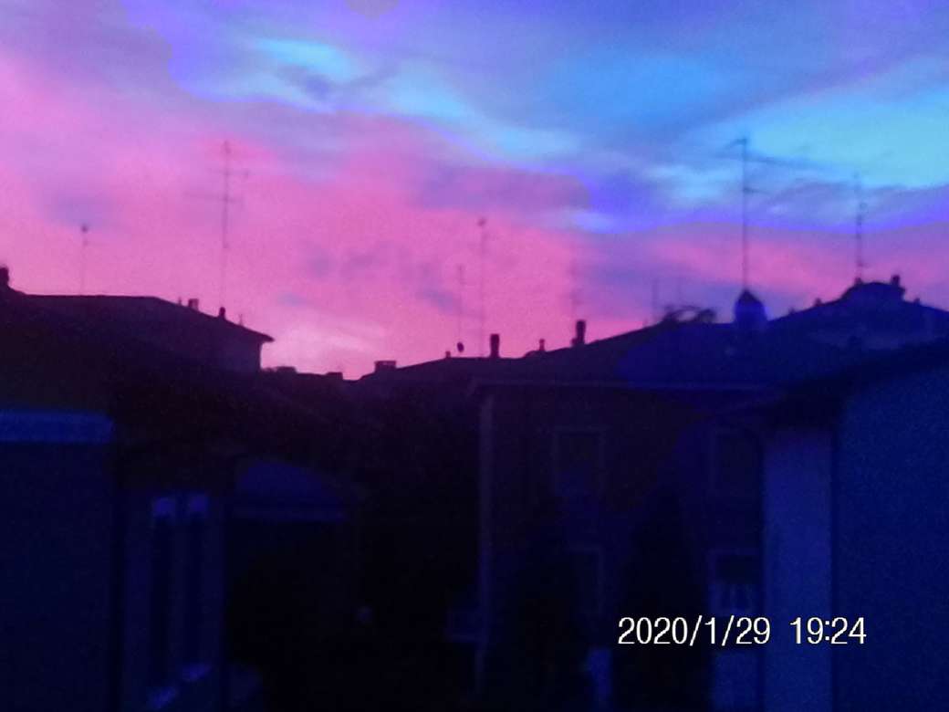 wieczorne zdjęcie zachodu słońca zrobione w Modenie puzzle online
