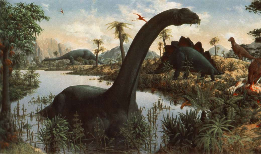 Dinozaur kąpie sie w bajorku i zajada puzzle online