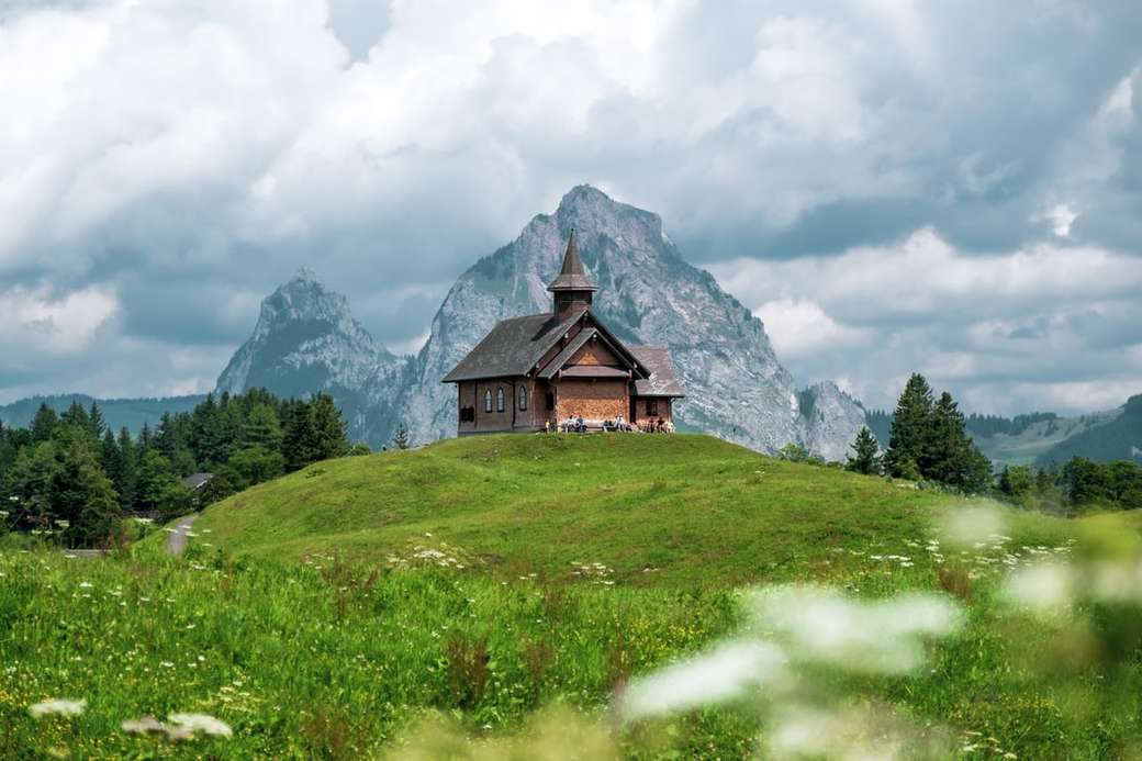 Bergkapelle Stoos nestled amongst the Swiss alps puzzle