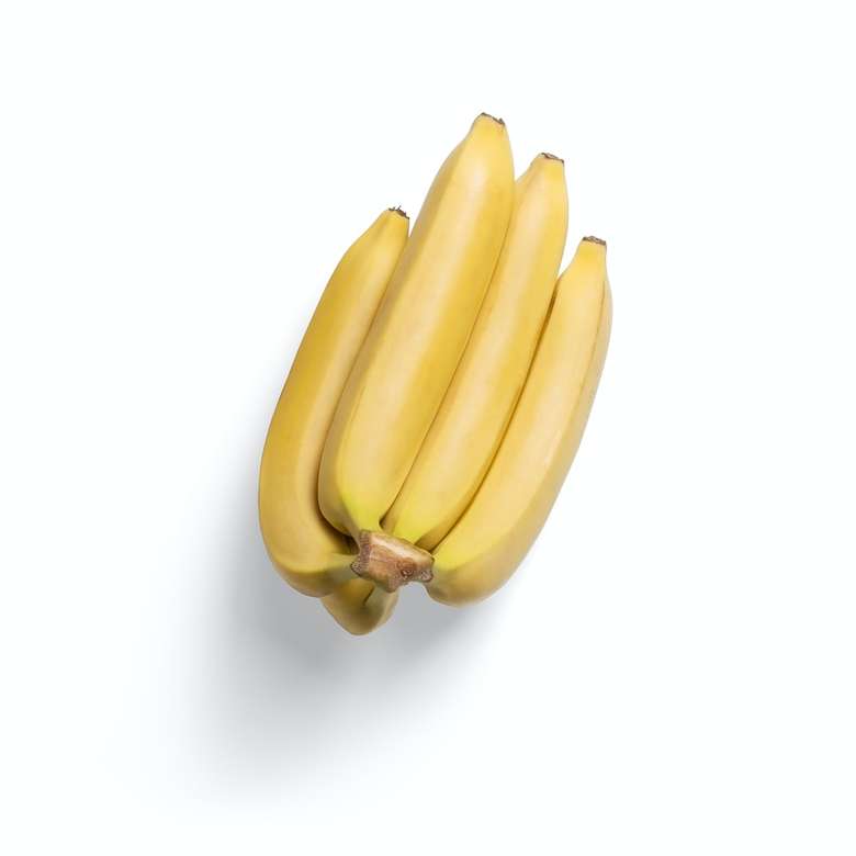 3 żółte owoce banana na białej powierzchni puzzle online