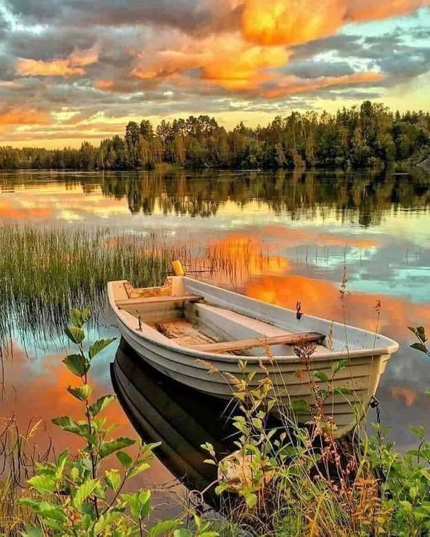 łodzią do jeziora o zachodzie słońca puzzle online