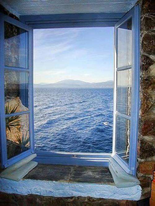 Ładne okno na morze puzzle online