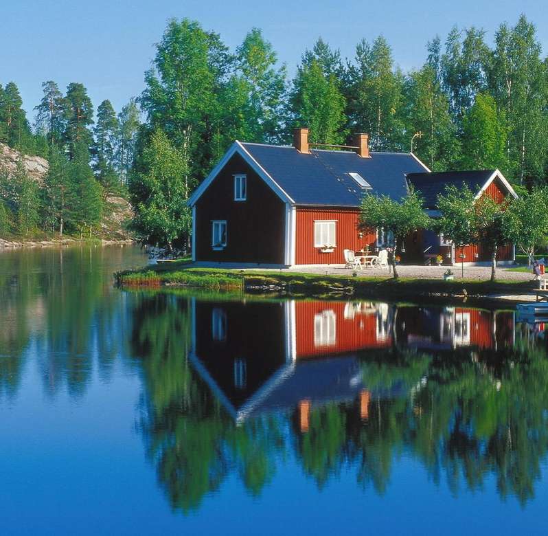 Czerwone domy nad rzeką w Szwecji puzzle online