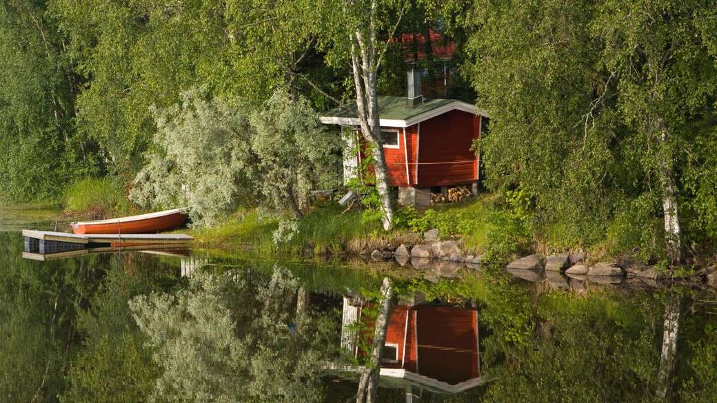 Chata z sauną nad jeziorem w Finlandii puzzle online