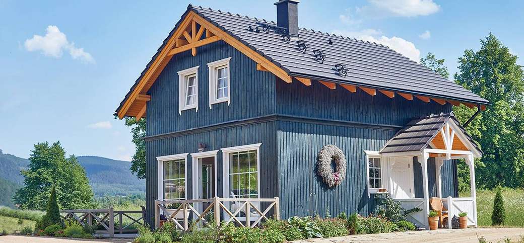 niebieski dom drewniany w norwegii puzzle online