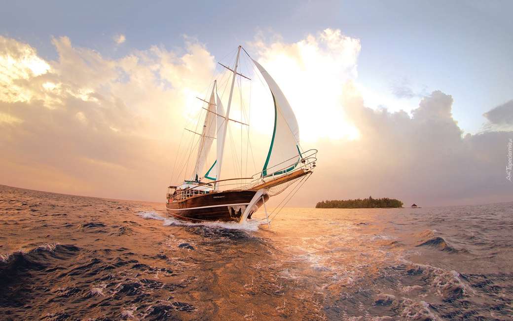 jacht na morzu- zachód słońca puzzle online