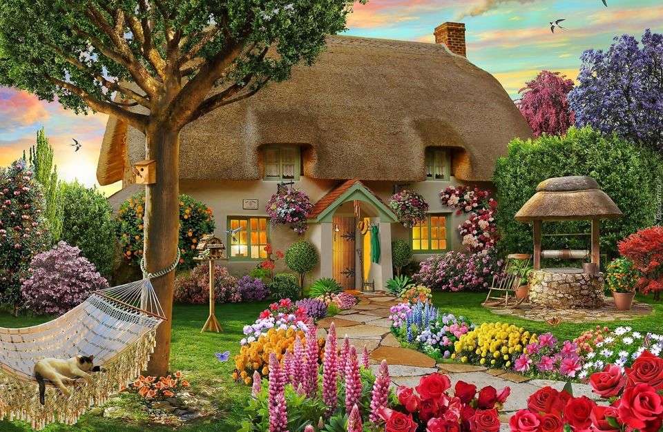 Wiejski domek z ogrodem pełnym kwiatów puzzle online