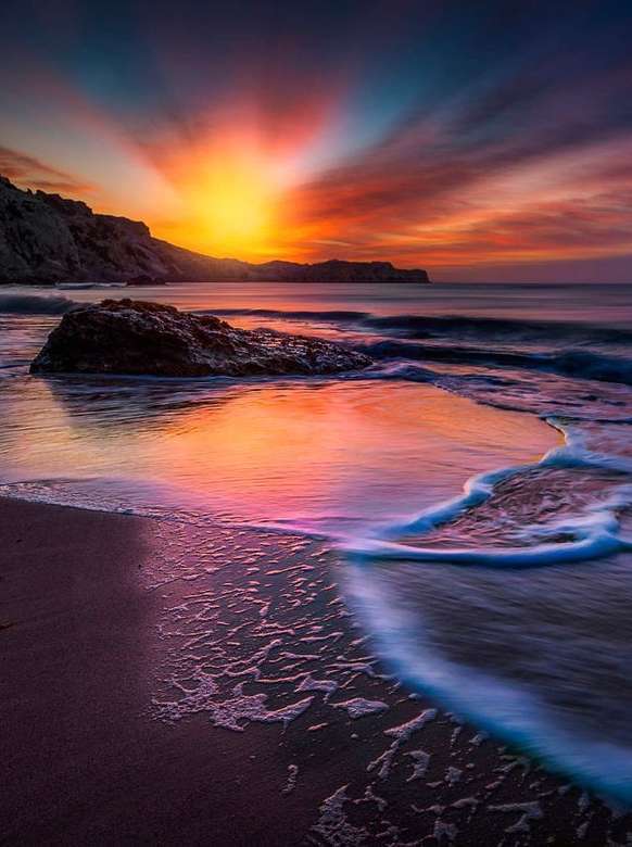 Piękny zachód słońca nad morzem puzzle online