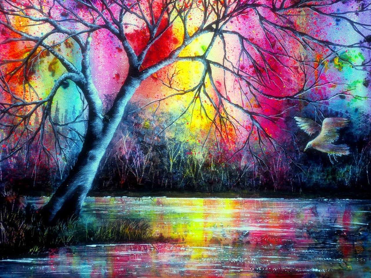 Drzewo w kolorowym świetle odbija się w jeziorze puzzle online
