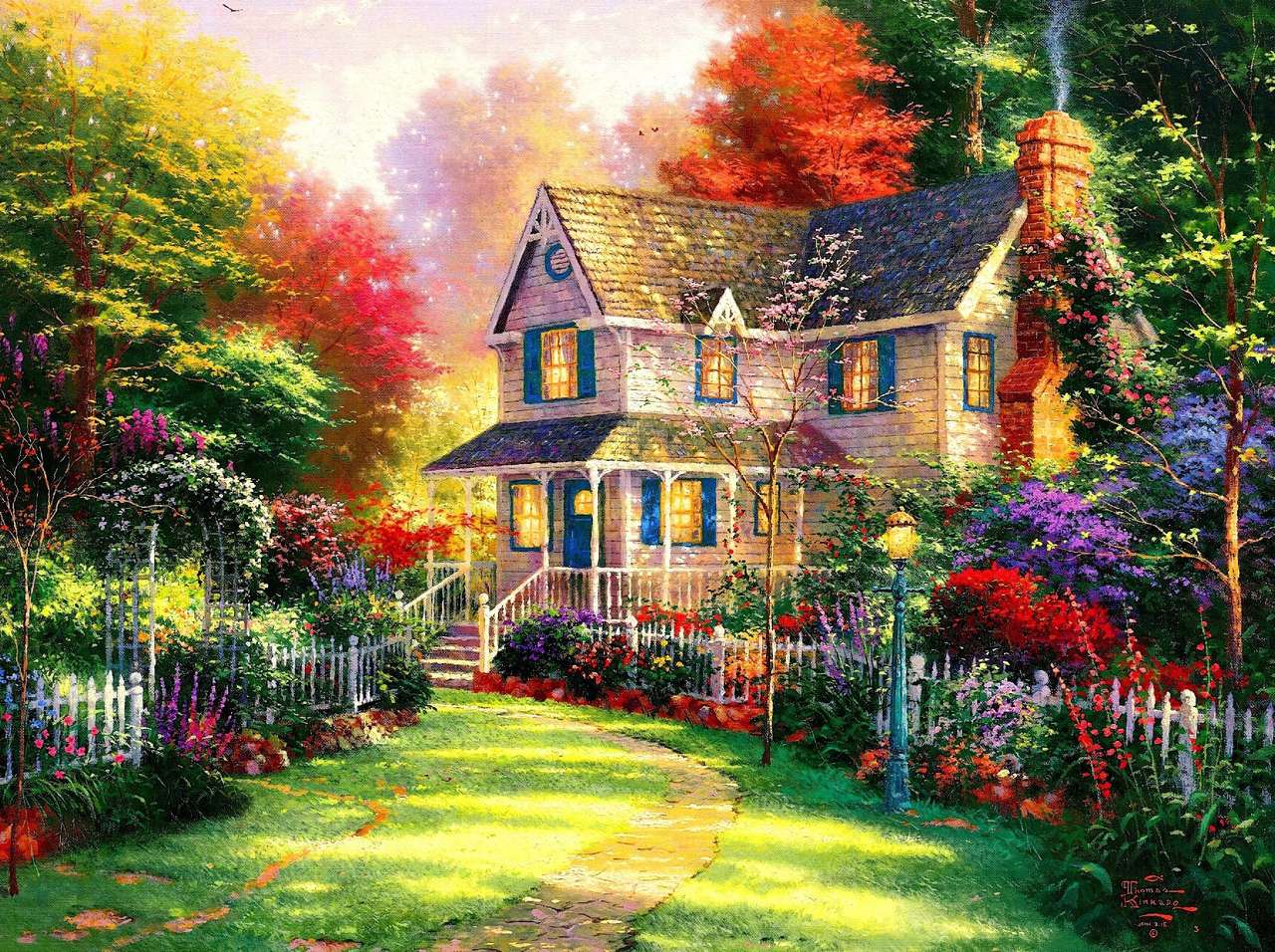 Dom otoczony kolorowymi kwiatami puzzle online