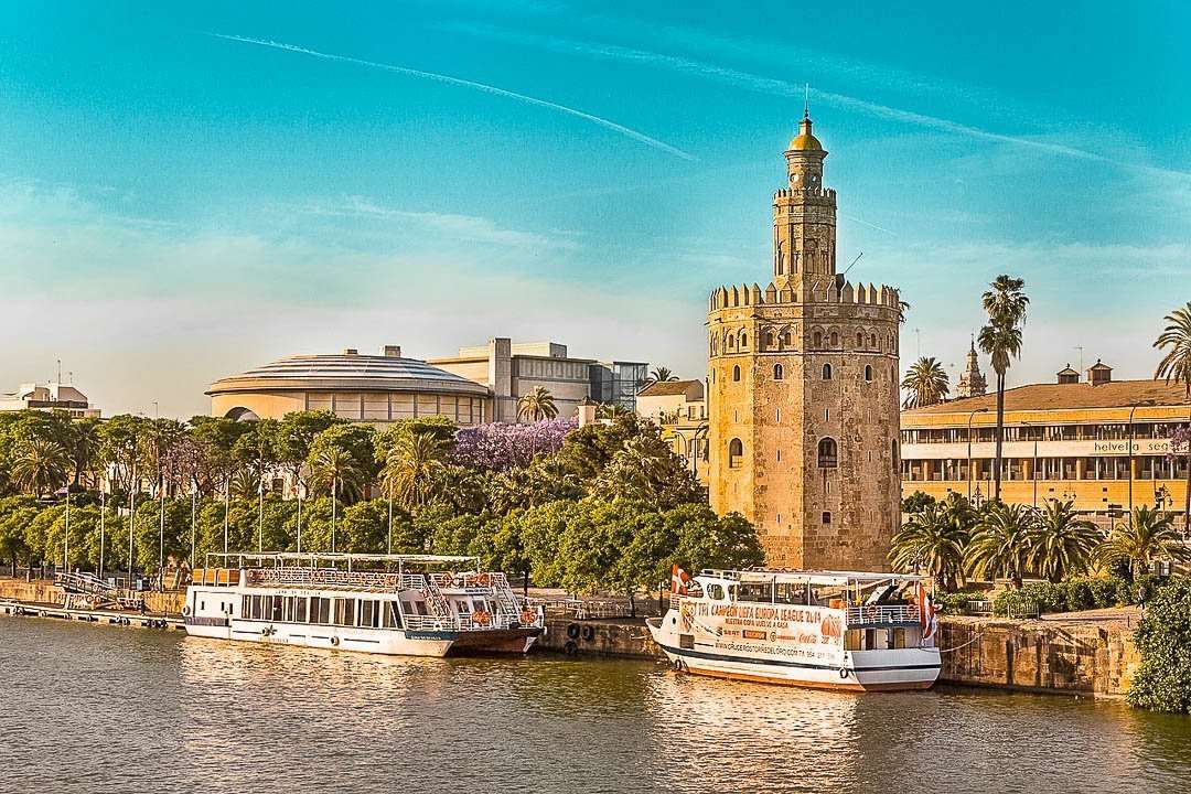 Sewilla wieża na rzece i statki puzzle online