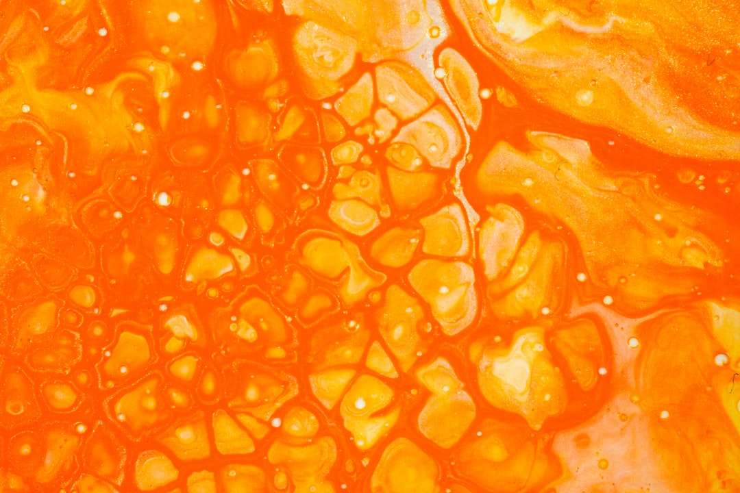 pomarańczowy płyn w fotografii z bliska puzzle online
