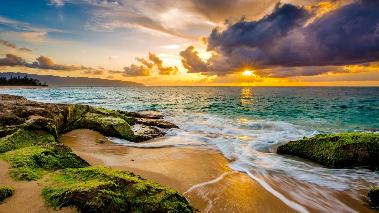 Plaża o zachodzie słońca puzzle online
