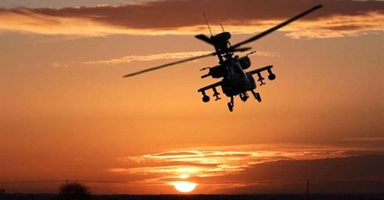 Apache z zachodem słońca puzzle online