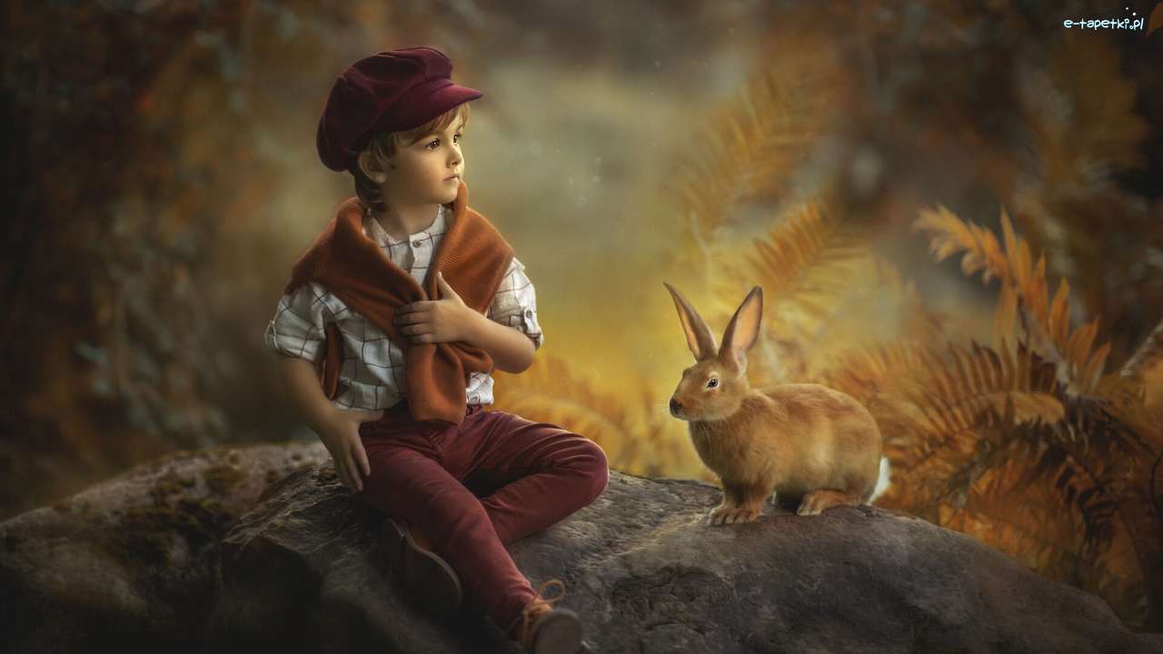 Chłopiez z królikiem puzzle online