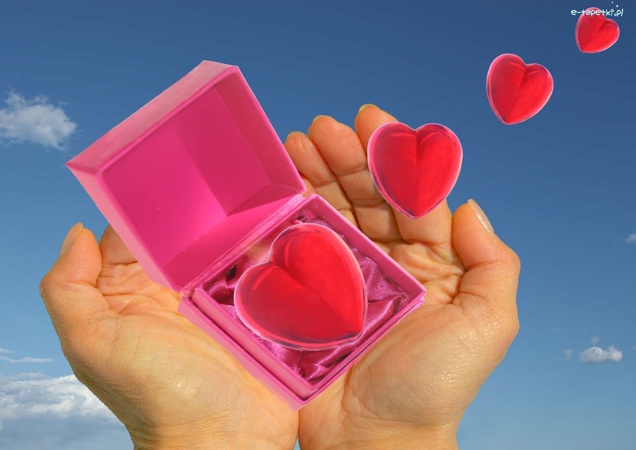 Grafika kompterowa- pudełko z sercami w dłoni puzzle online