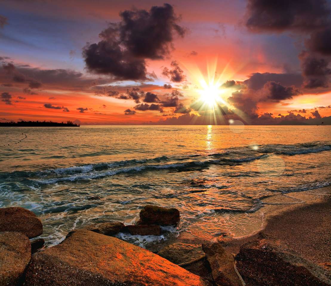 Zachód słońca na plaży puzzle online