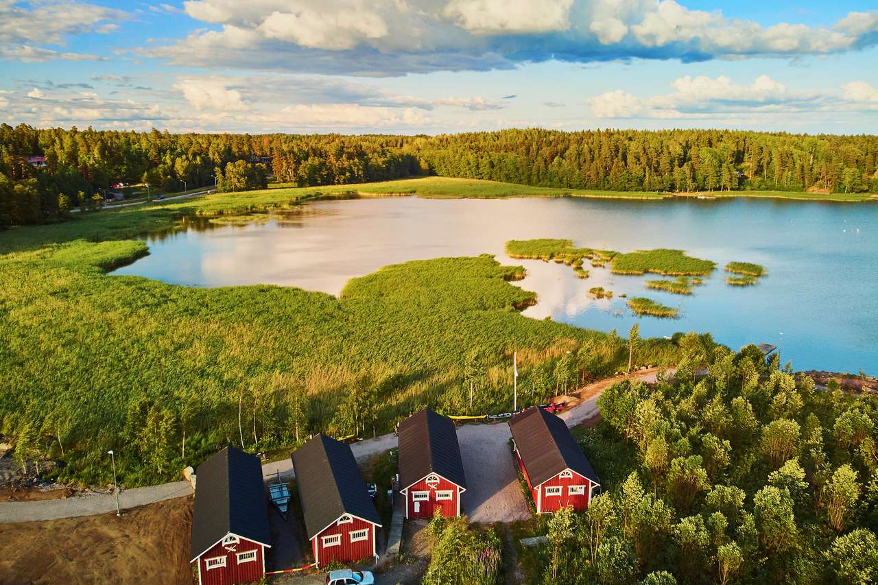 wieś Finlandii o zachodzie słońca puzzle online