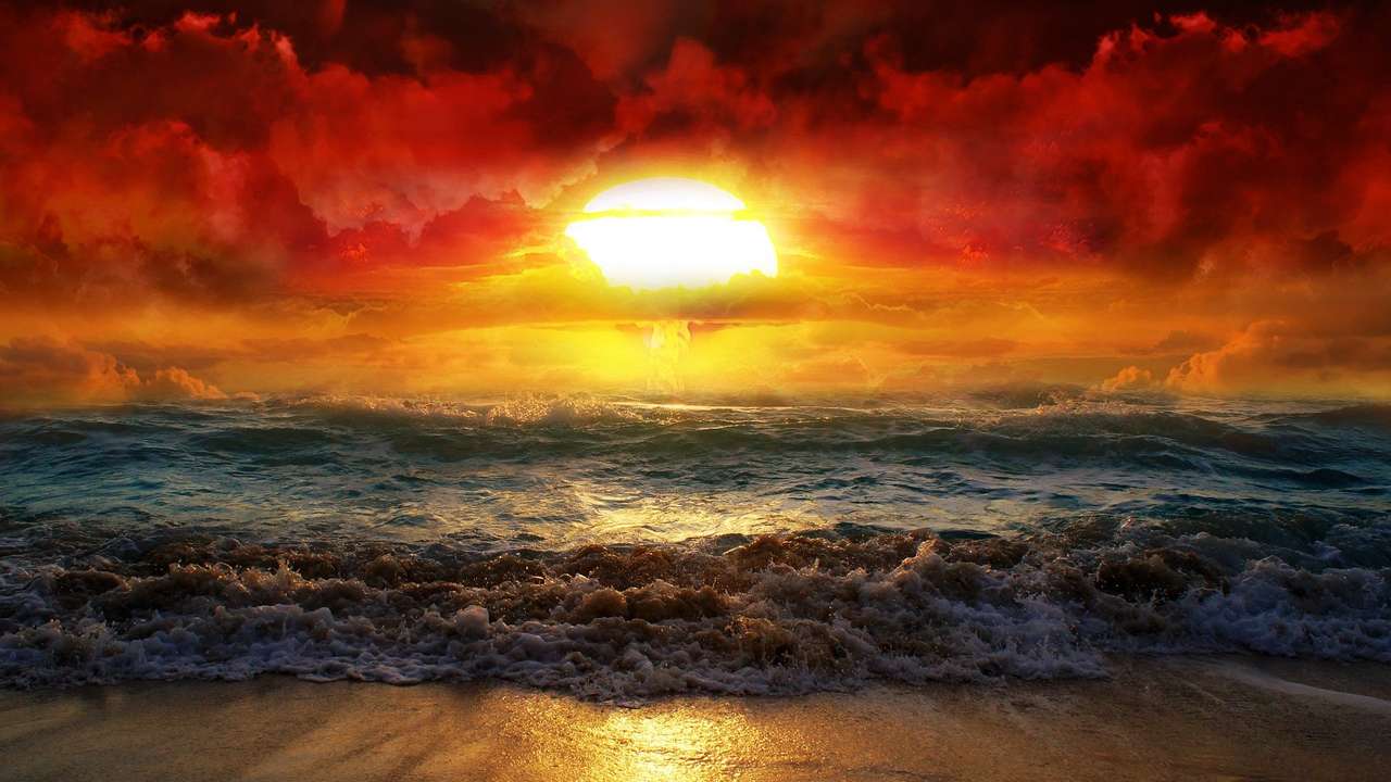 zachód słońca nad morzem puzzle online
