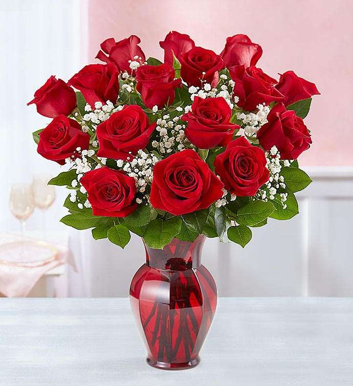 Czerwone róże w wazonie puzzle online