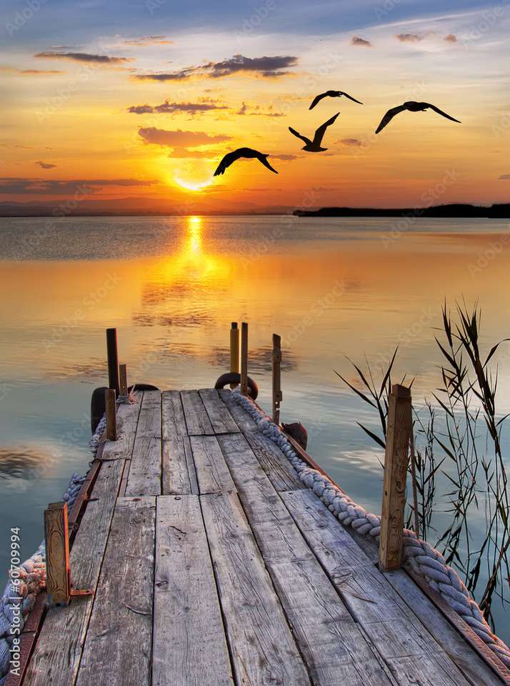 Zachód słońca nad jeziorem puzzle online