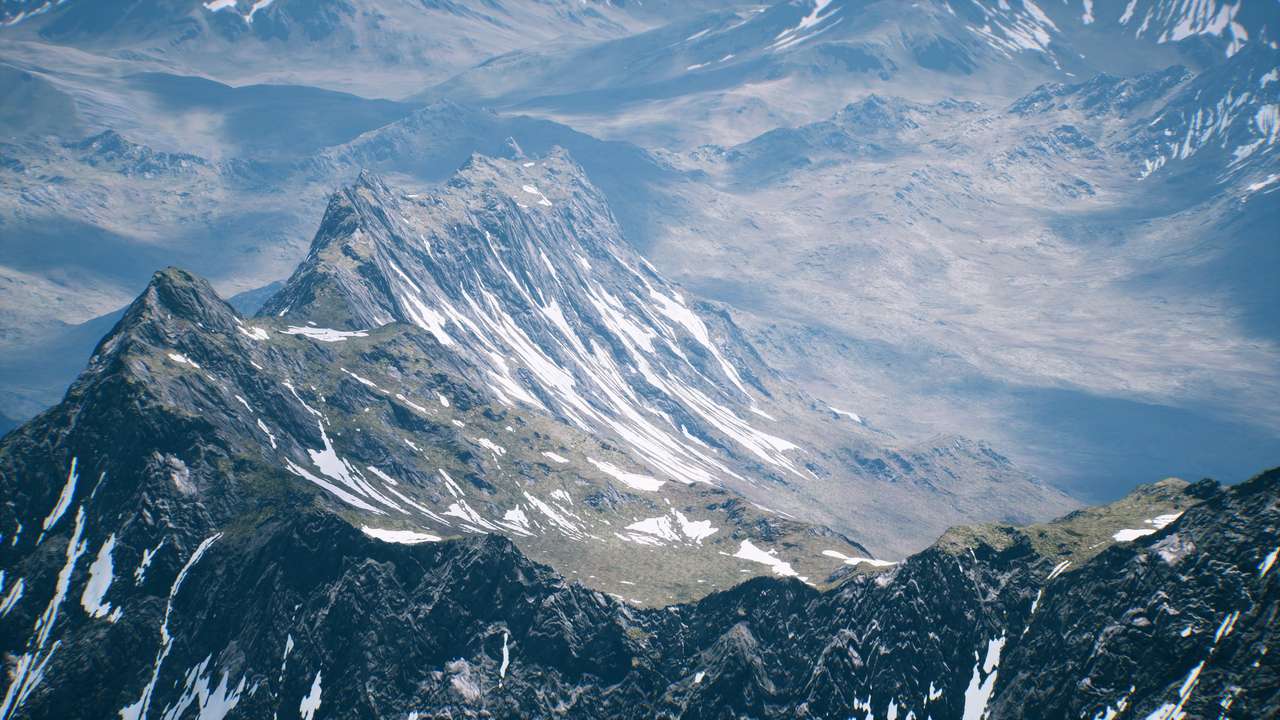 Widok z lotu ptaka Krajobraz gór pokryty śniegiem puzzle online
