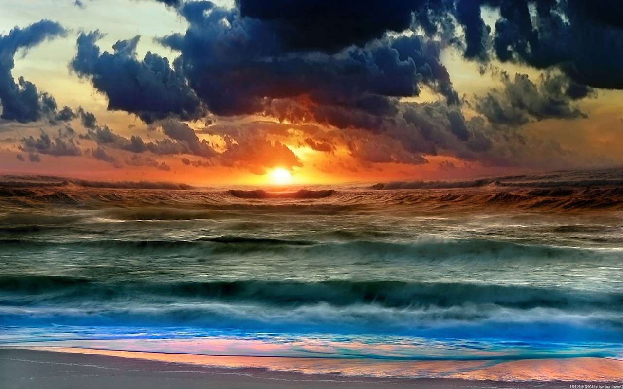 Ηλιοβασίλεμα πάνω από τη θάλασσα παζλ