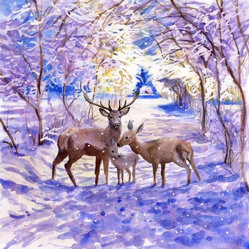 Liten hjortfamilj i den snöiga skogen pussel