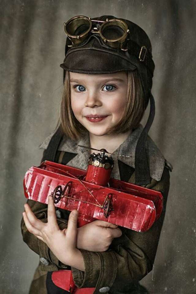 portret dziewczyny z samolotem puzzle online