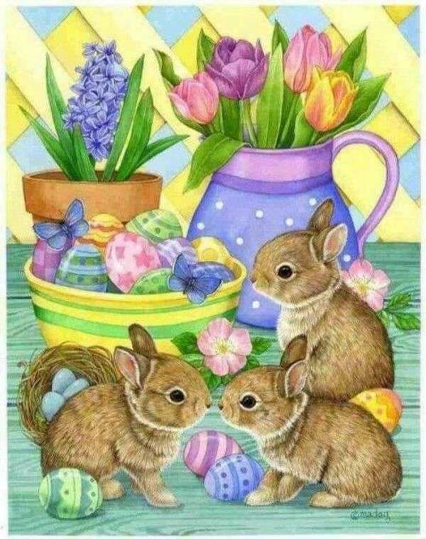 Małe króliczki otoczone jajkami i kwiatami puzzle online