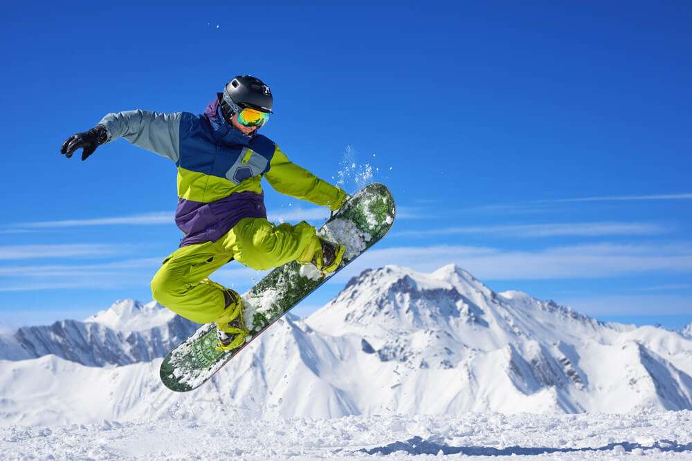 Snowboarding- sport zimowy na desce snowboardowej. puzzle online