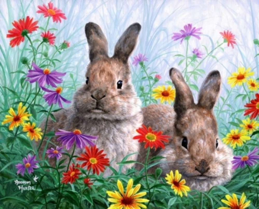 dwa króliki wśród kwiatów puzzle online