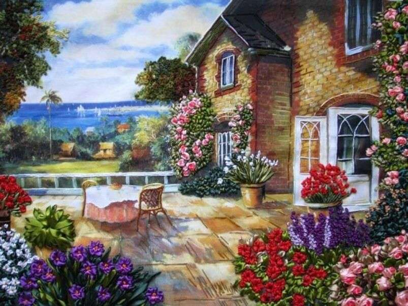 Piękny dom z kwiatami nad jeziorem #5 puzzle online