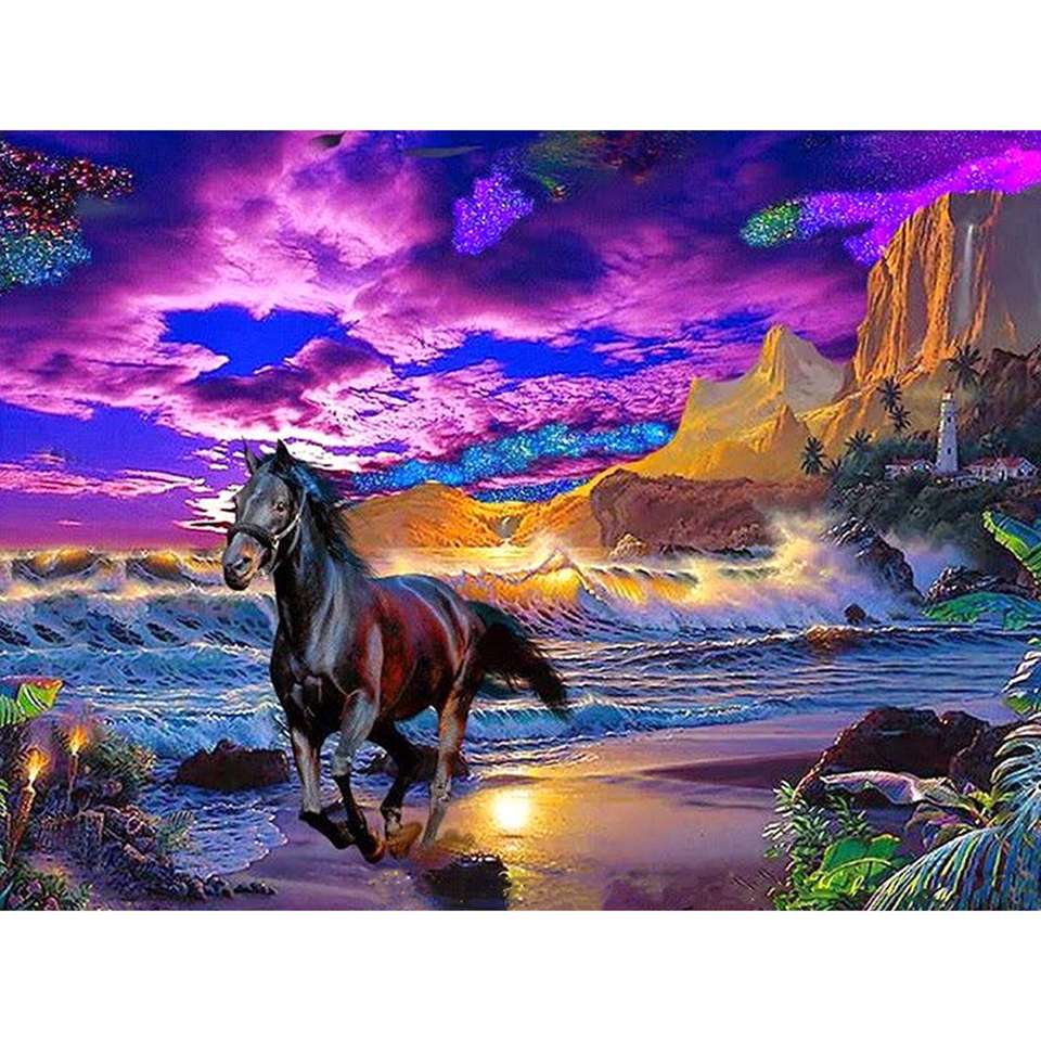 koń biegający po plaży puzzle online