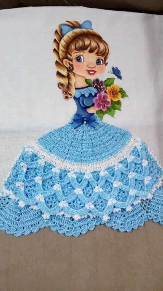 Jasnoniebieska lalka z dzianiny ze spódnicą puzzle online