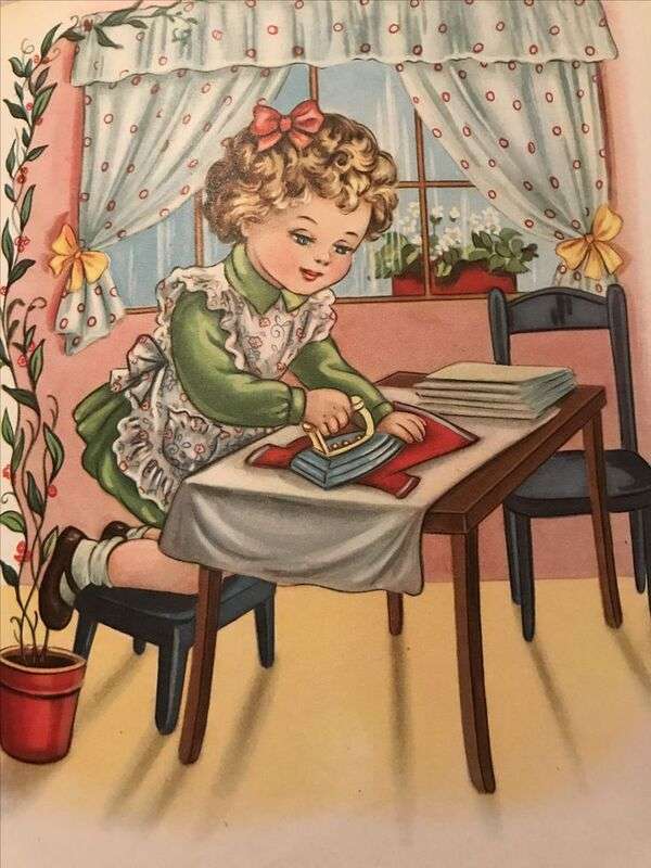Piękna mała dziewczynka prasowanie ubrań puzzle online