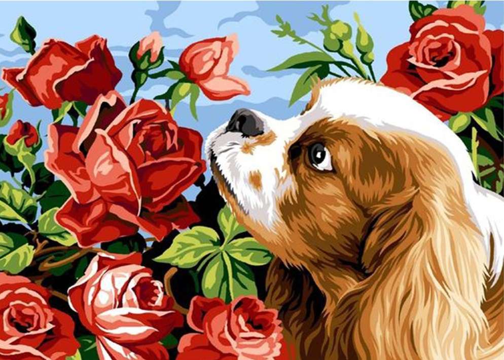 szczeniak wąchający róże puzzle online