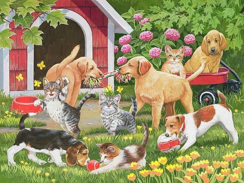 Szczeniaki i kocięta bawią się w ogrodzie puzzle online