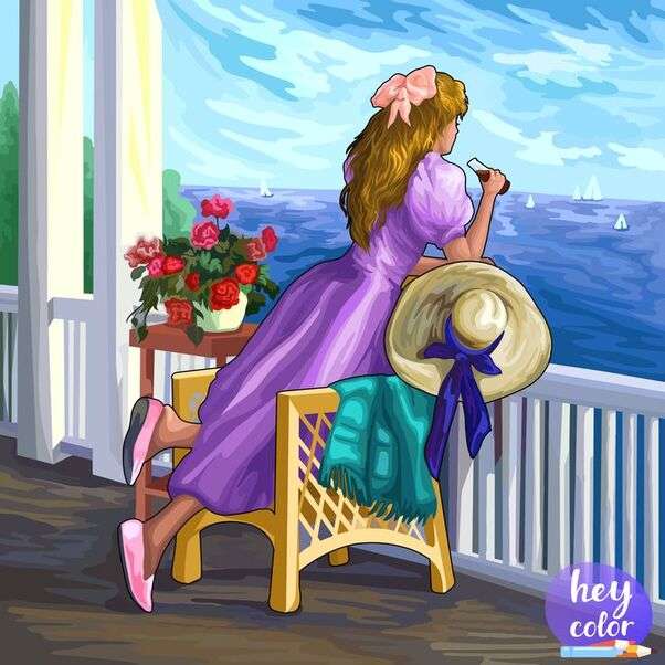 Dziewczyna patrząca na morze ze swojego balkonu puzzle online