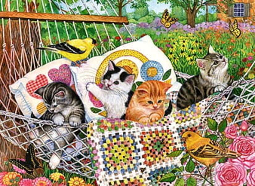 Kocięta w ogrodzie w hamaku puzzle online