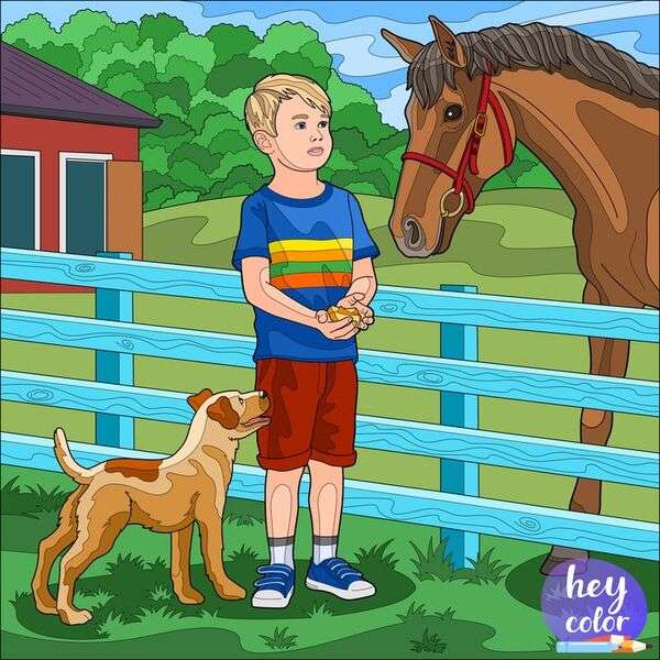 Chłopiec karmi swojego konia puzzle online