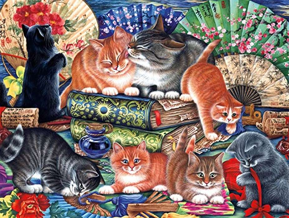 koty między książkami a fanami puzzle online